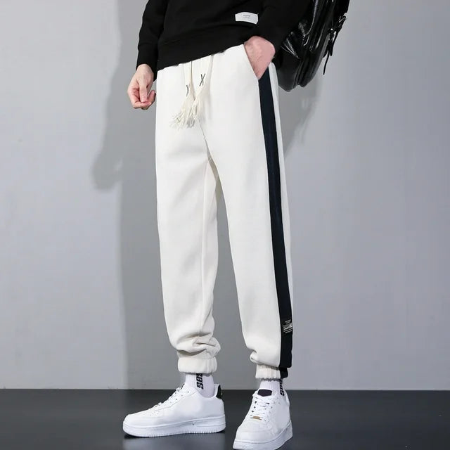 Joggers i vintage kordfløyel med kontrastfargede striper