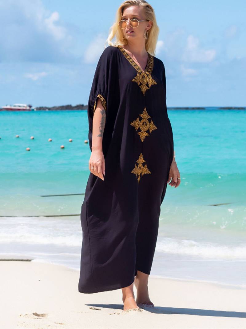 Elegant retro strandkjole med V-utringning
