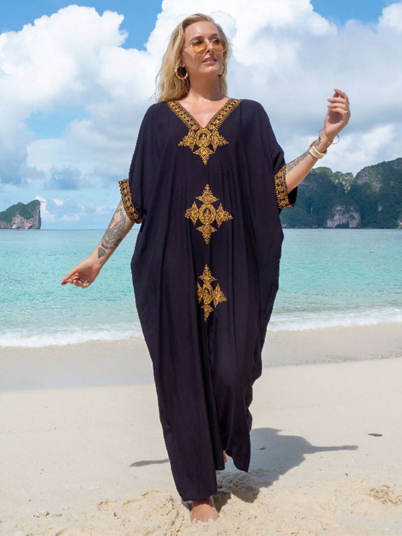 Elegant retro strandkjole med V-utringning
