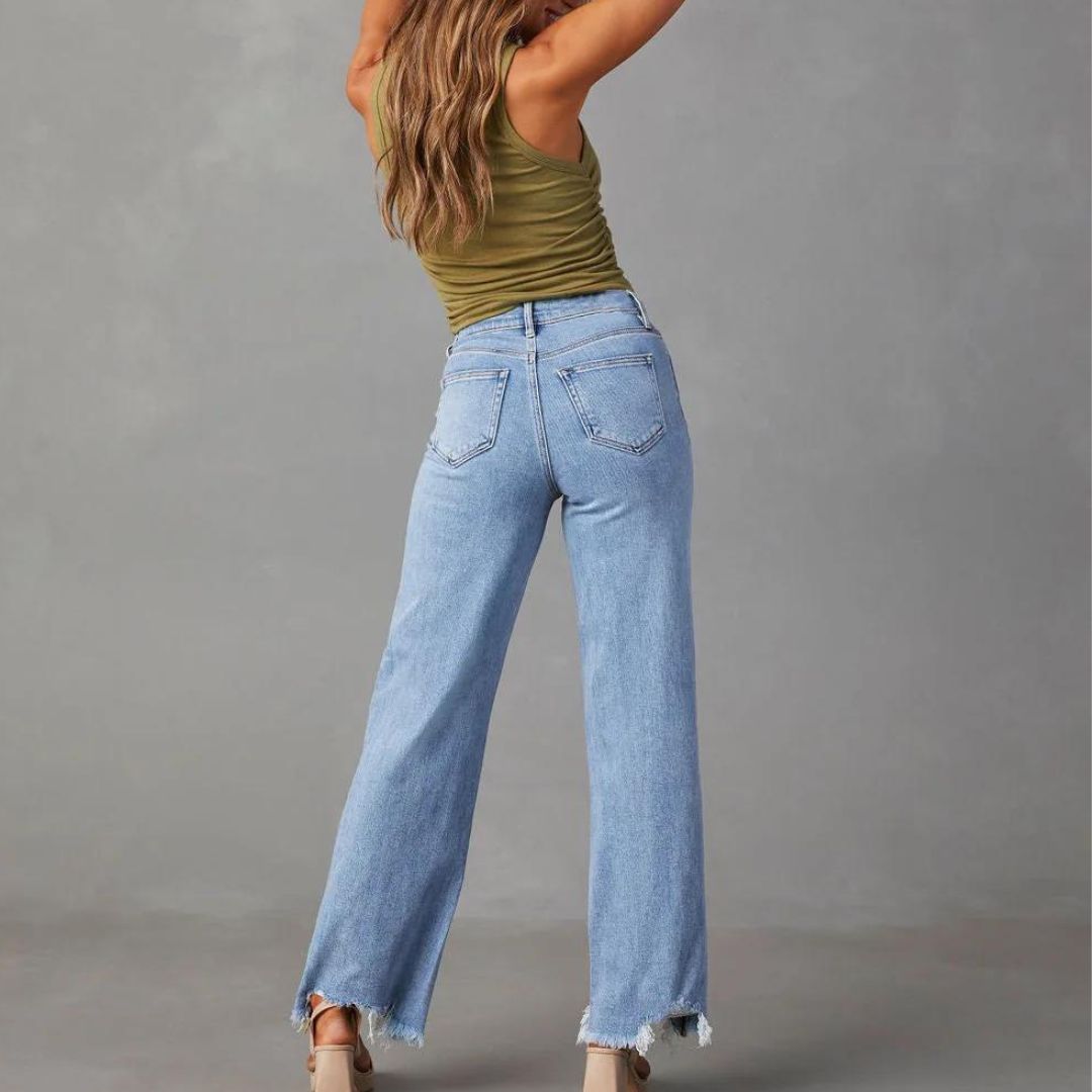 Rette jeans med frynser forneden