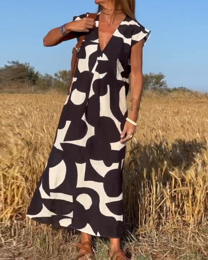 Elegant sommerkjole med trykk