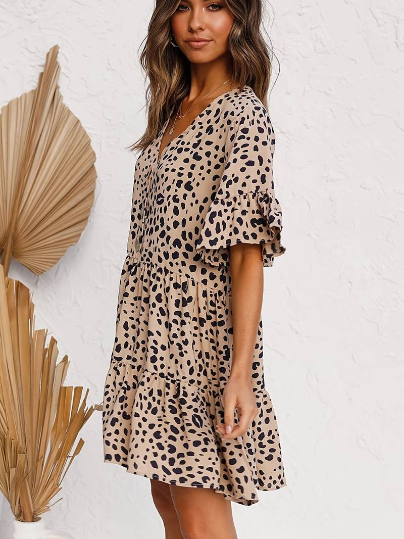 Kjole med leopardmønster og knapper