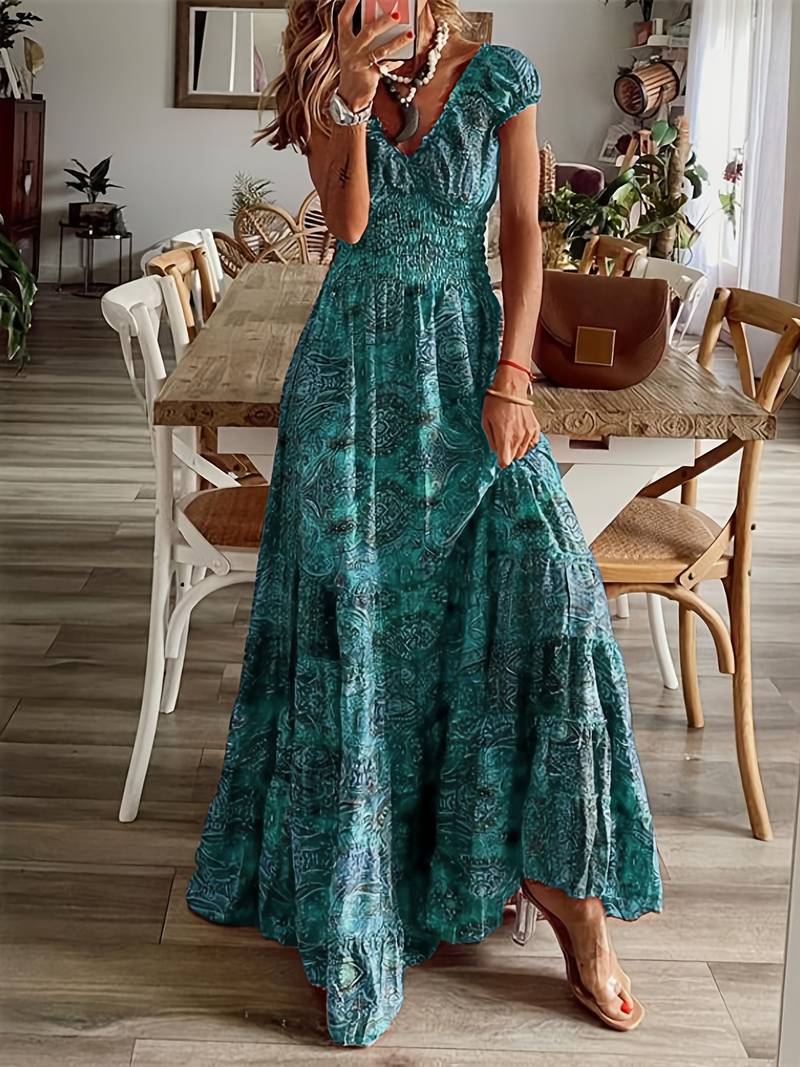 Lang kjole med volangutringning og blomstertrykk