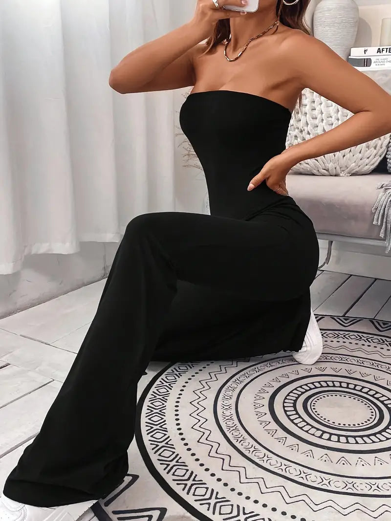 Robust jumpsuit med vide ben og utsvungne ben