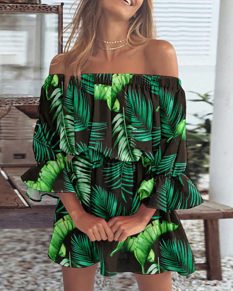 Kjole uten skuldre med boho-bladtrykk