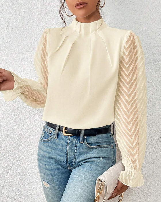 En langermet topp i kystchic stil