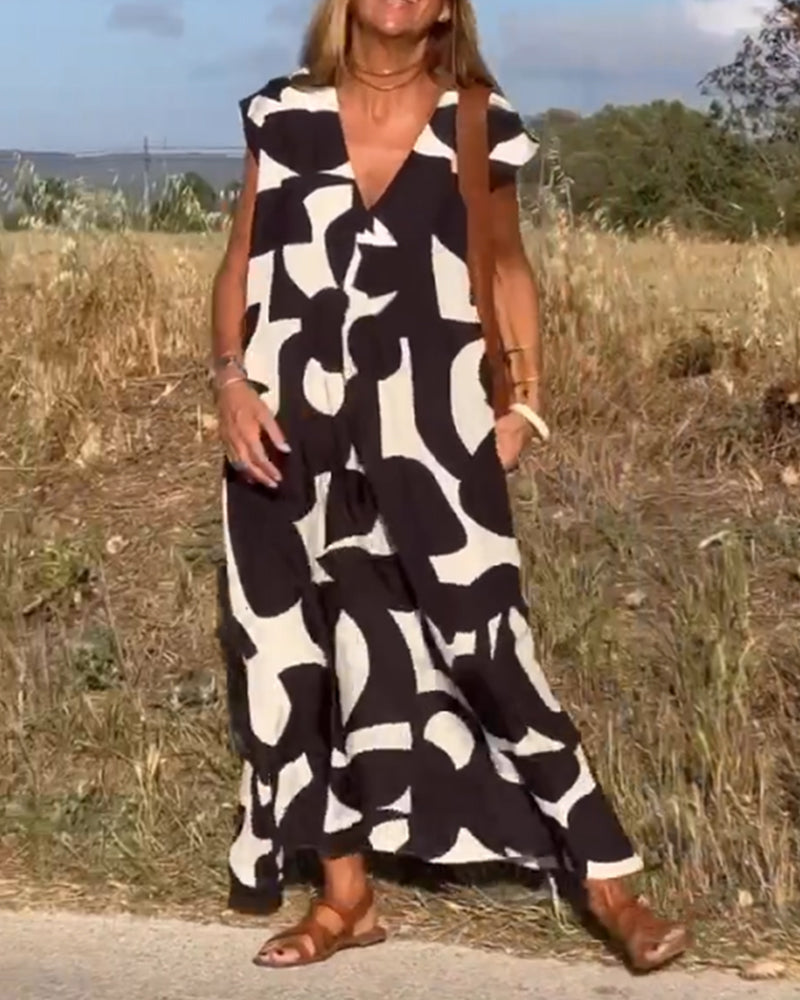Elegant sommerkjole med trykk