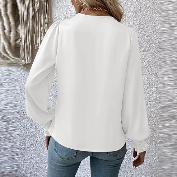Elegant blusetopp med V-hals og ballongermer