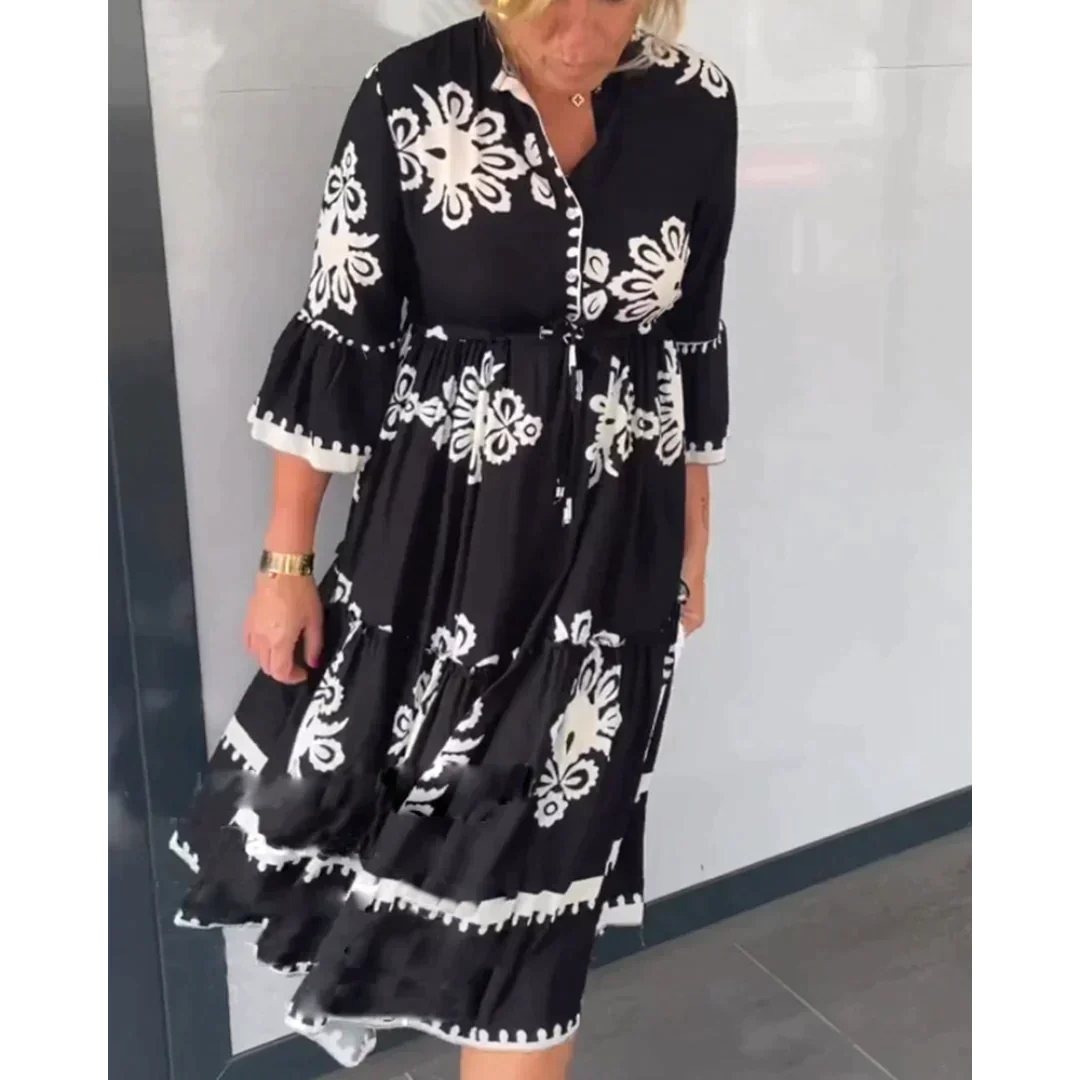 Blomstret kjole med 3/4 ermer