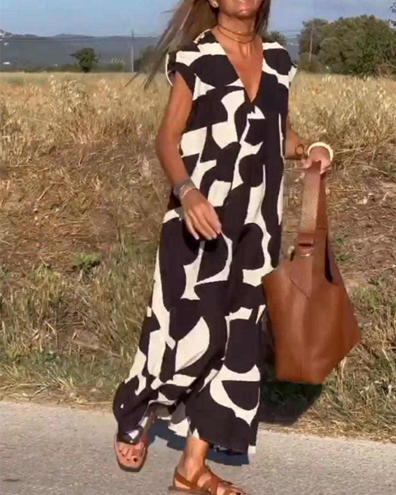 Elegant sommerkjole med trykk