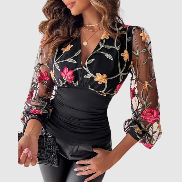 Bluse med broderte, gjennomsiktige ermer