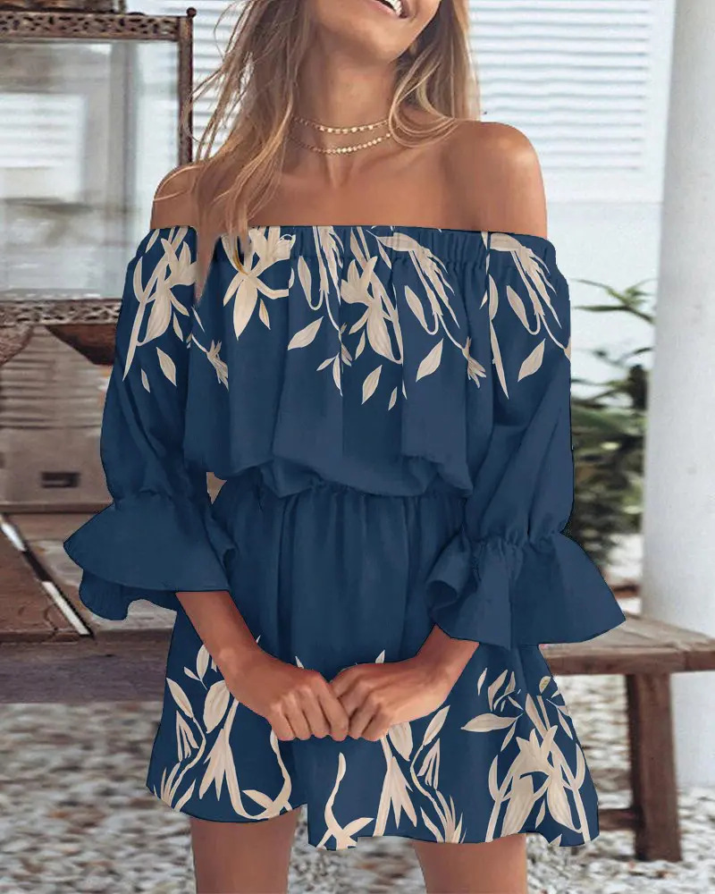 Kjole uten skuldre med boho-bladtrykk