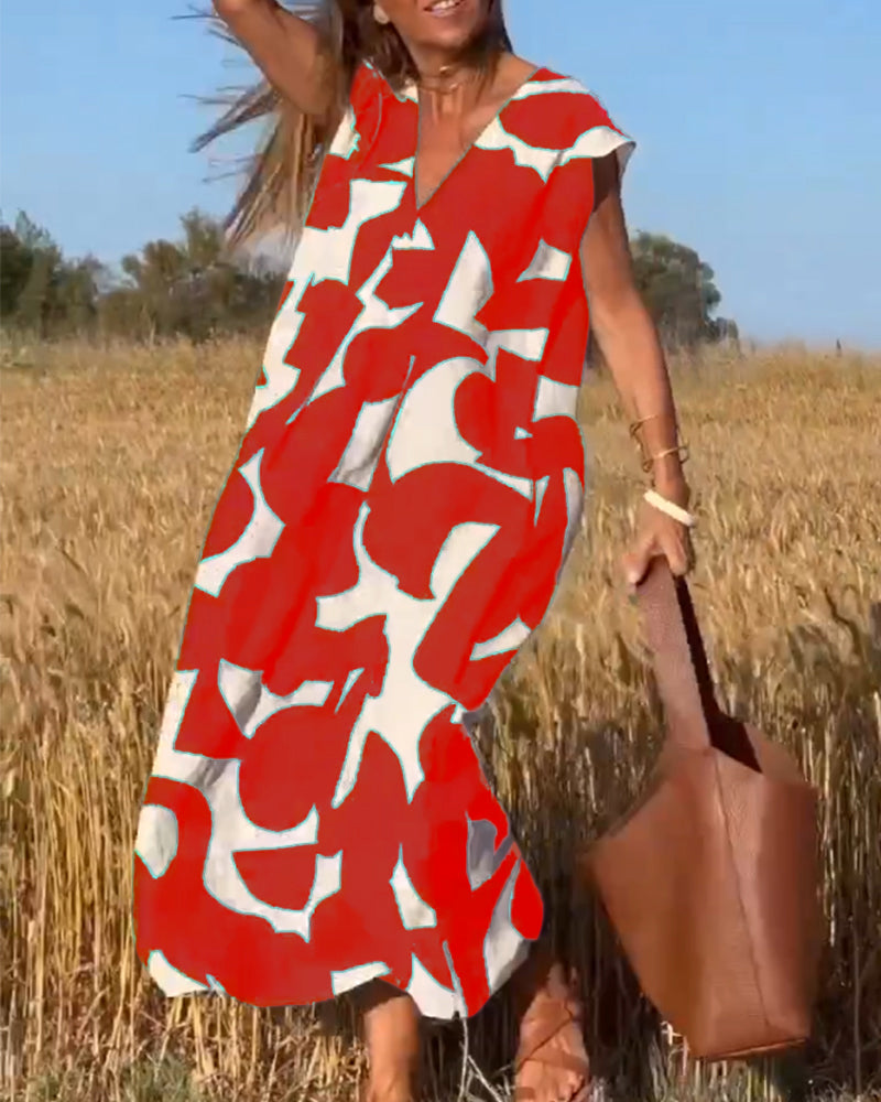 Elegant sommerkjole med trykk