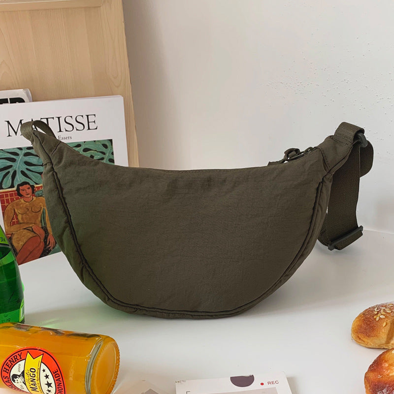 Halvmåneformet pose