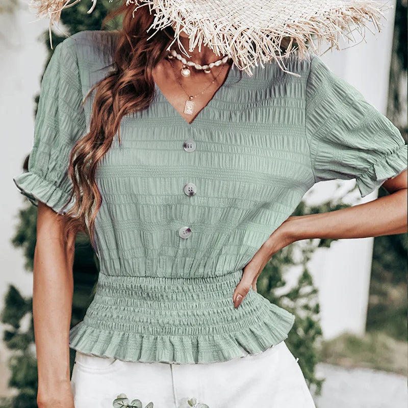 Plissert bluse med knappefront og peplum