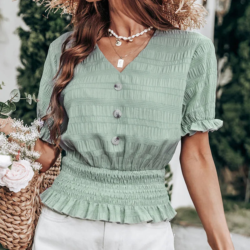 Plissert bluse med knappefront og peplum