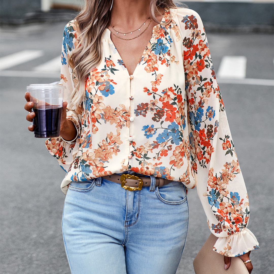 Elegant blomstrete bluse