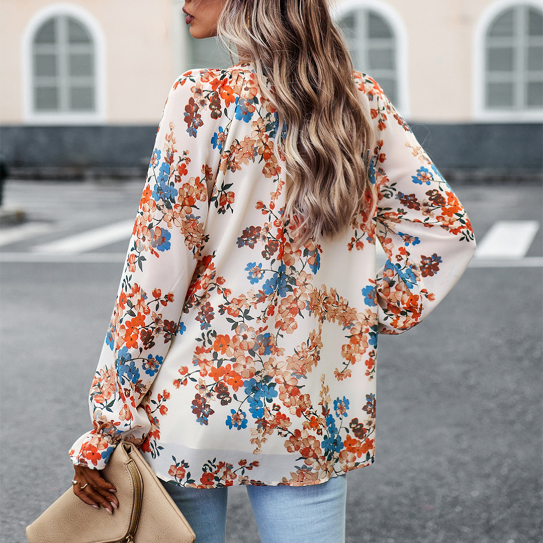Elegant blomstrete bluse