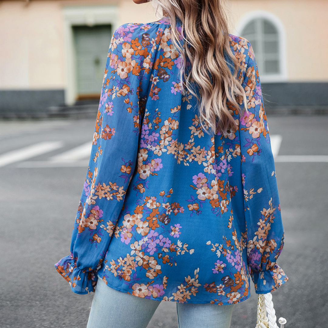 Elegant blomstrete bluse