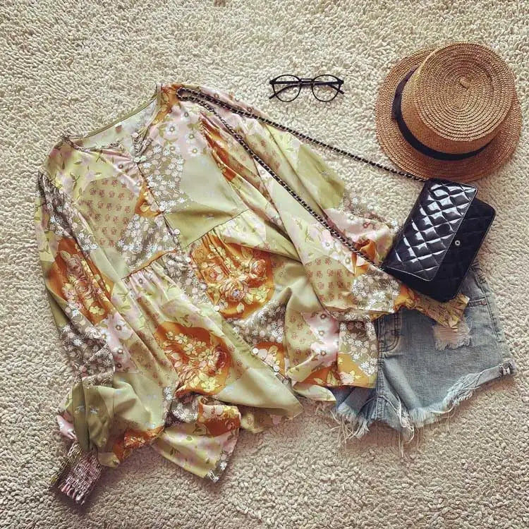 Lappeteppet boho-bluse med knapp