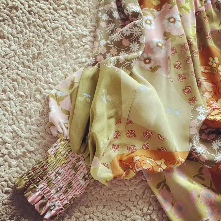 Lappeteppet boho-bluse med knapp