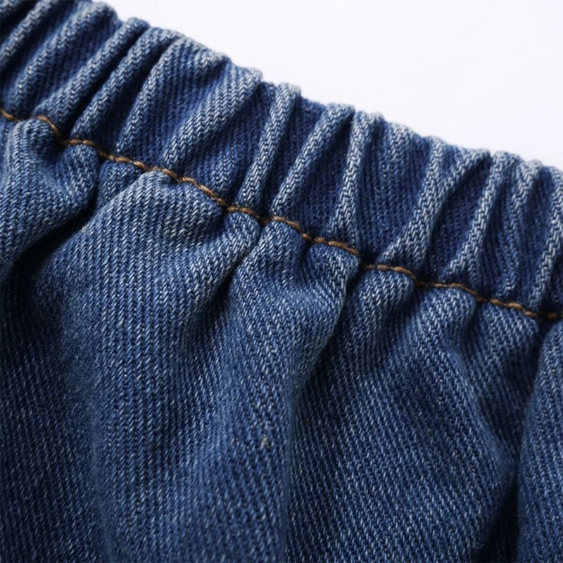 Bandeautopp i denim med blomstret choker
