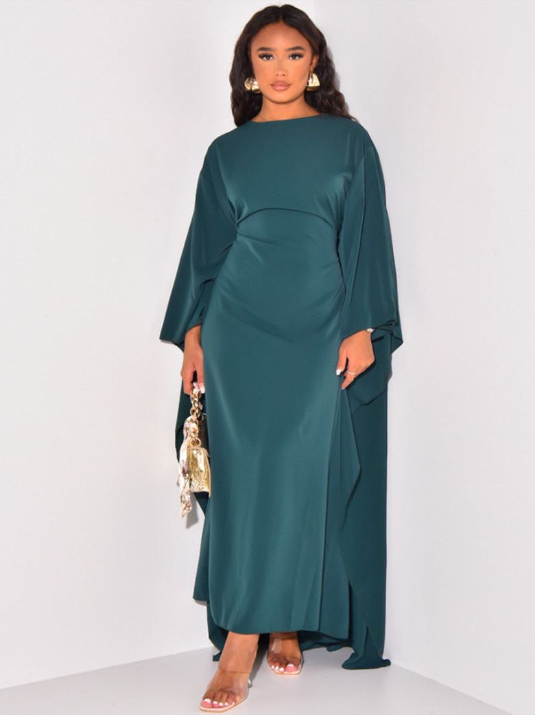 Elegant kjole med flaggermusermer