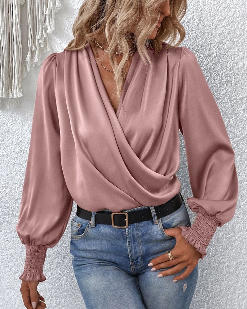 Elegant langermet omslagsbluse