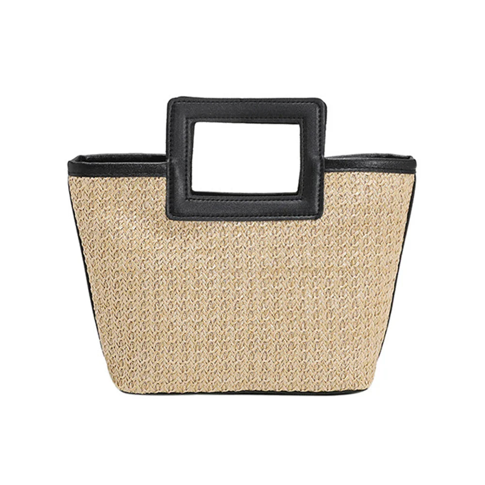 Elegant clutch med tekstur og iøynefallende håndtak