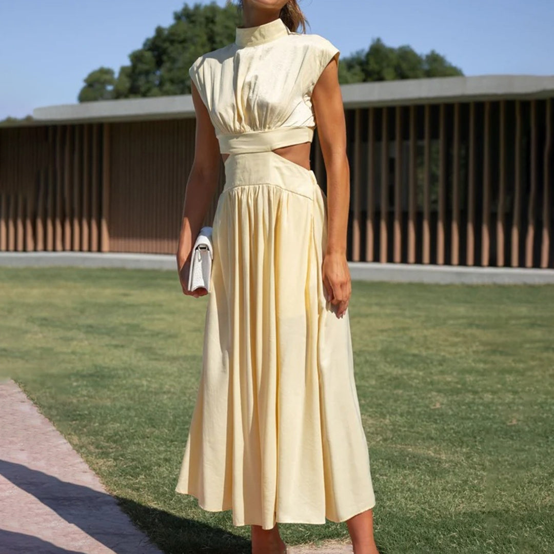Elegant ermeløs kjole