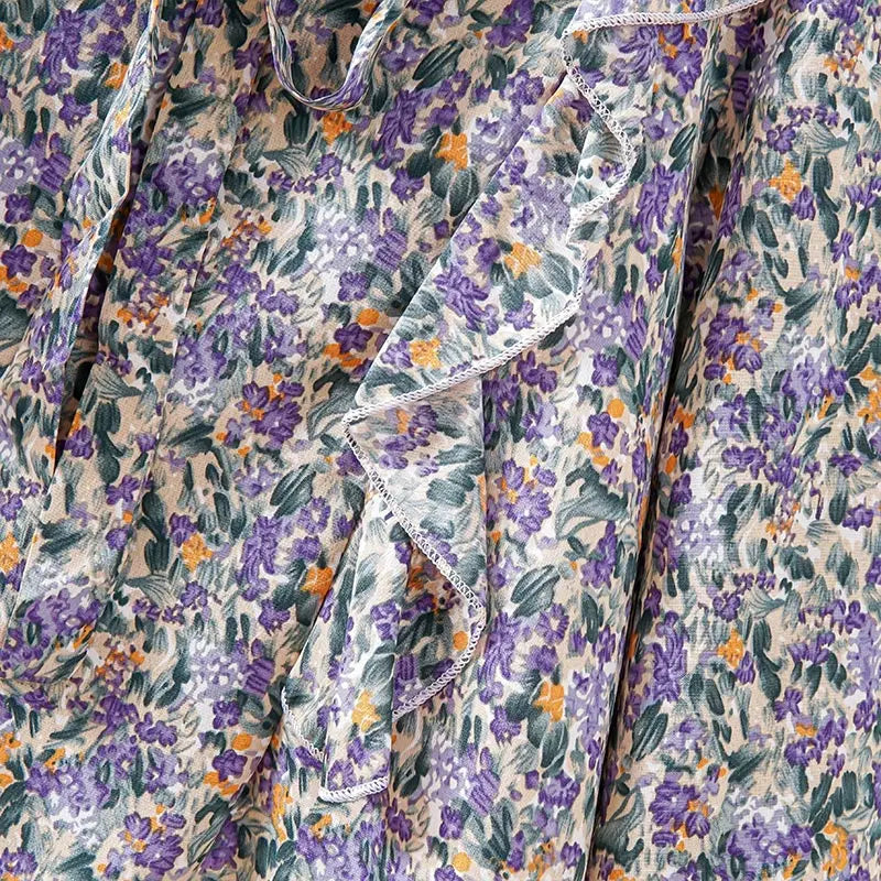 Blomstret bluse med sløyfekrage