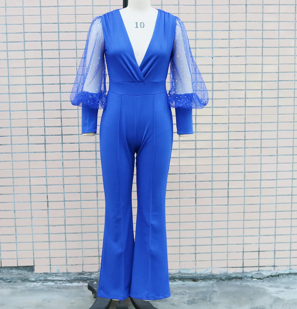 Jumpsuit med glitter og vide ben