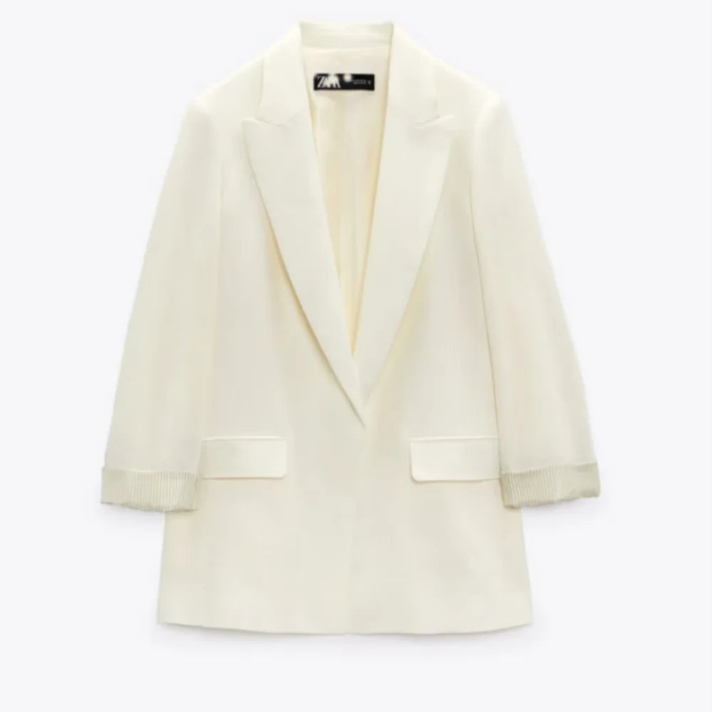 Flerfarget, åpen blazer for dame med ermer med trykk, revers og uten knapper