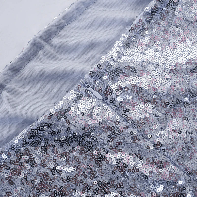 Glitrende paljettjumpsuit med stroppeløs modell