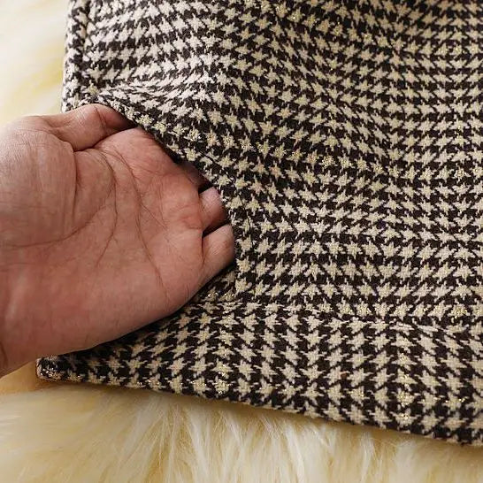 Klassisk blyantskjørt med houndstooth-mønster
