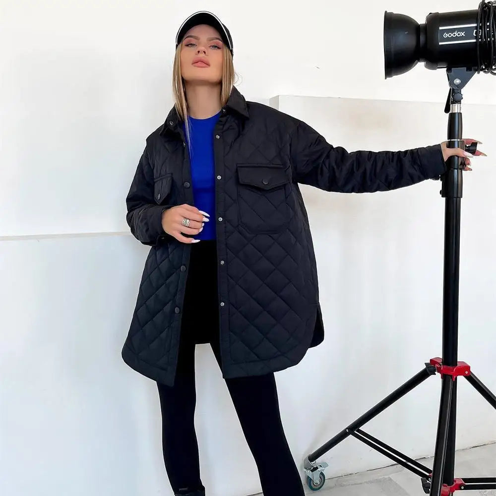 Klassisk vattert jakke med trykknapper