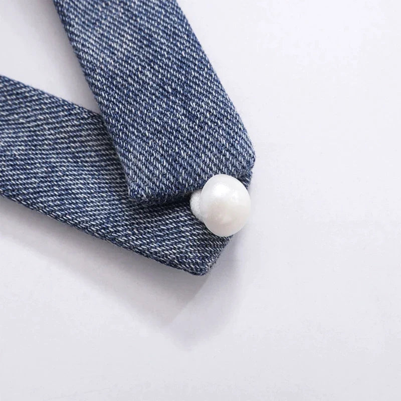 Bandeautopp i denim med blomstret choker