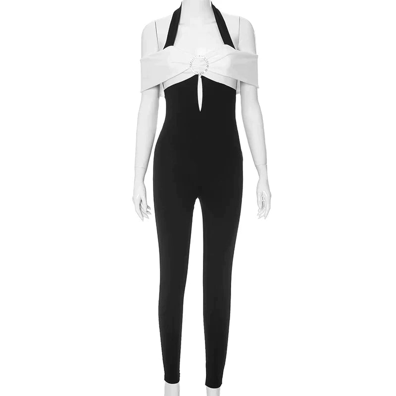 Monokrom jumpsuit med halterneck og sløyfe som aksent