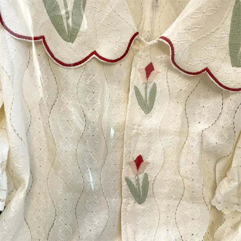 Retrobluse med Peter Pan-krage og blomstermønster