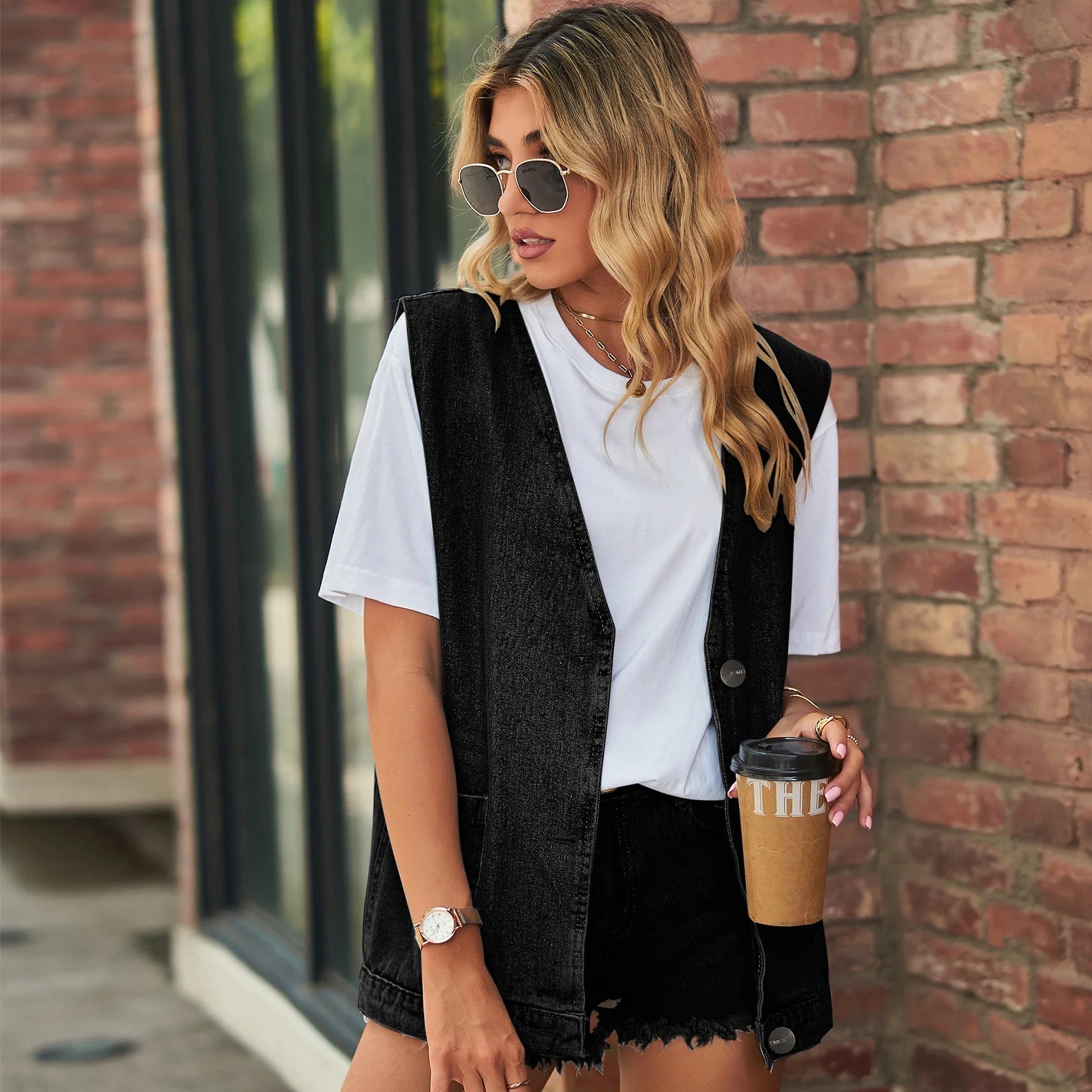 Kvinnes Minimalistiske Denim Vest med Ermeløs Design og Avslappet Passform
