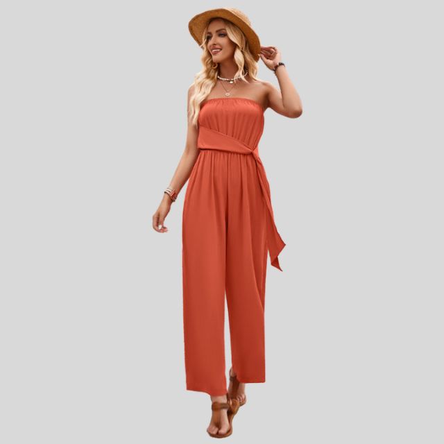 Jumpsuit uten skuldre og med bindebånd i midjen