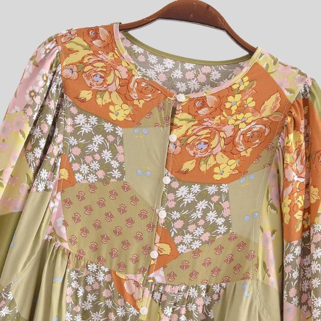 Lappeteppet boho-bluse med knapp