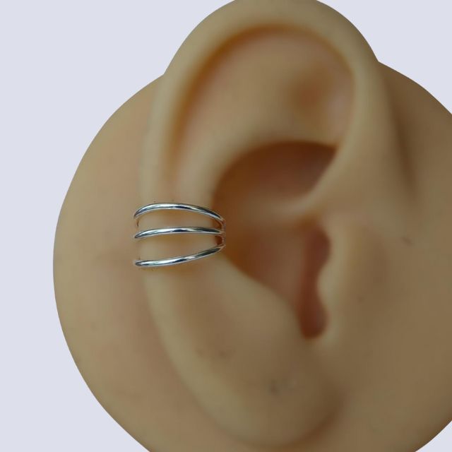 Spiralformet øremansjett med skinnende overflate