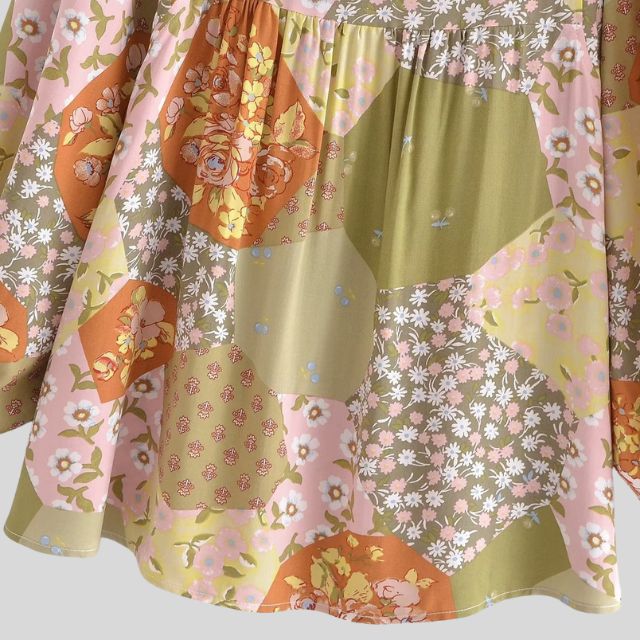 Lappeteppet boho-bluse med knapp