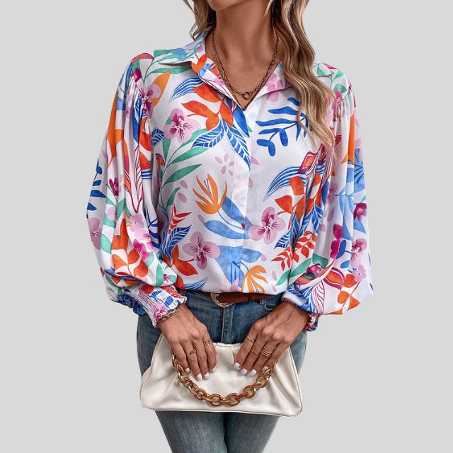 Flytende bluse med blomstertrykk