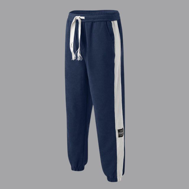 Joggers i vintage kordfløyel med kontrastfargede striper