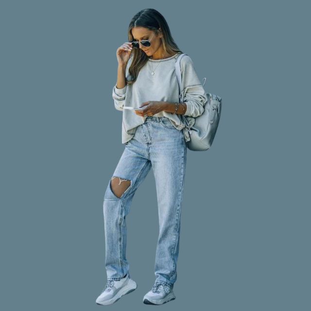 Jeans med høy midje og slitte detaljer