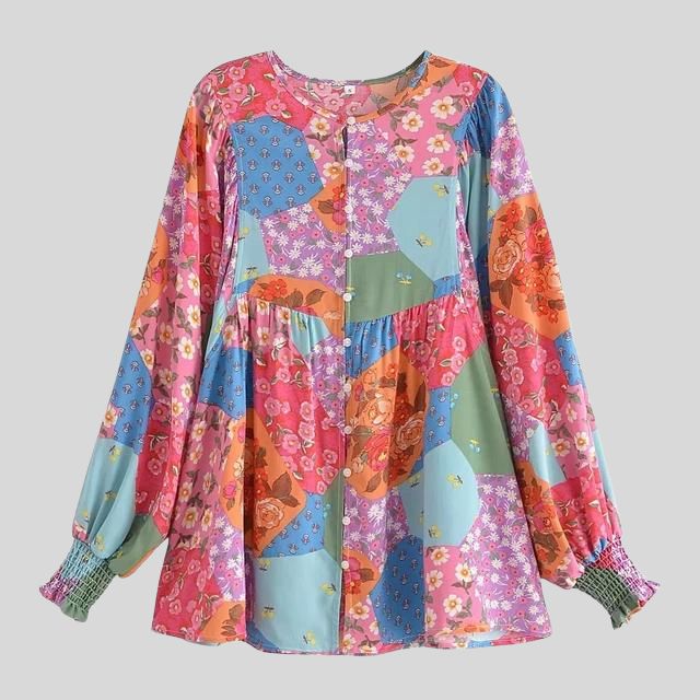 Lappeteppet boho-bluse med knapp