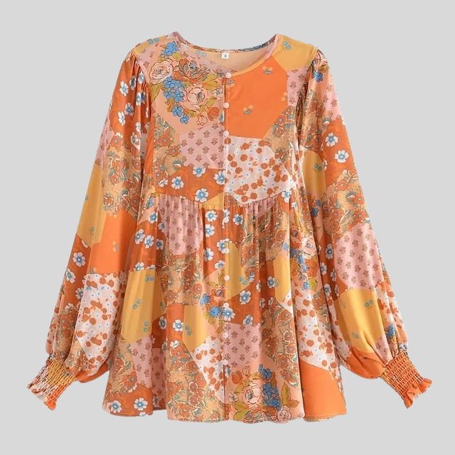 Lappeteppet boho-bluse med knapp