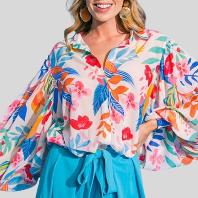 Flytende bluse med blomstertrykk